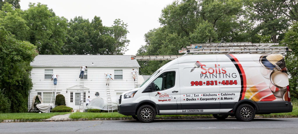 Freshly painted exterior trim and shutters on a New Jersey home